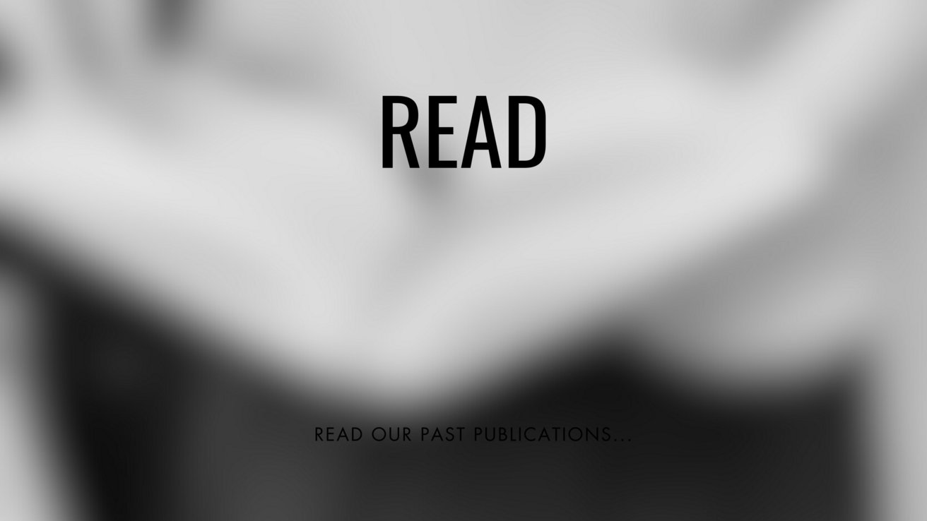 blurred image of person holding an open book